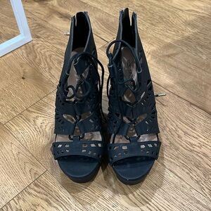 Brand new never worn wedge heel size 7.5